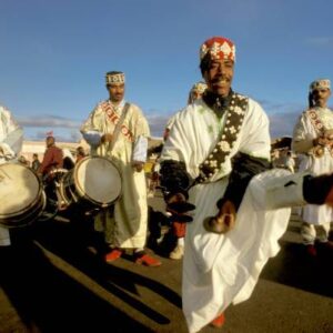 Gnaoua Musicians with Marching Djellaba and Ornate Caps